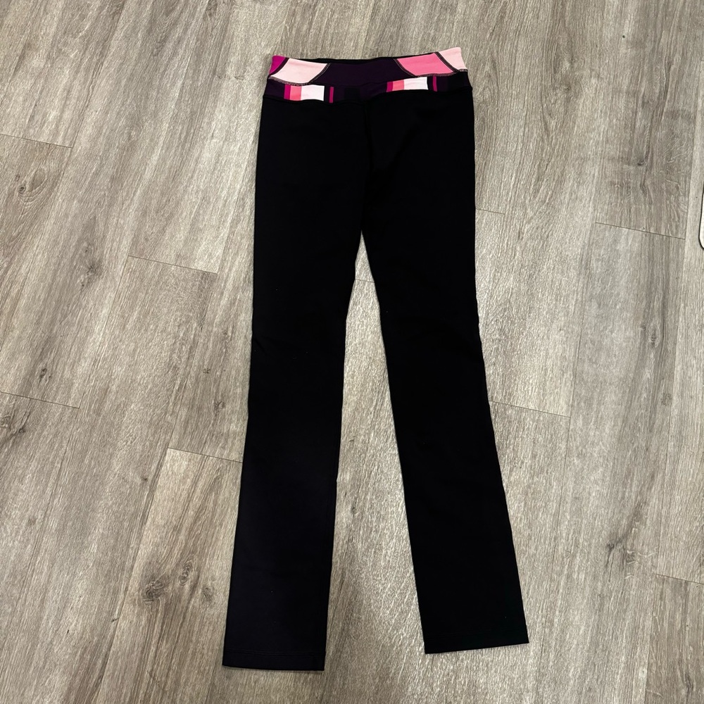 Lululemon black straight leggings with pink geometric print waistband